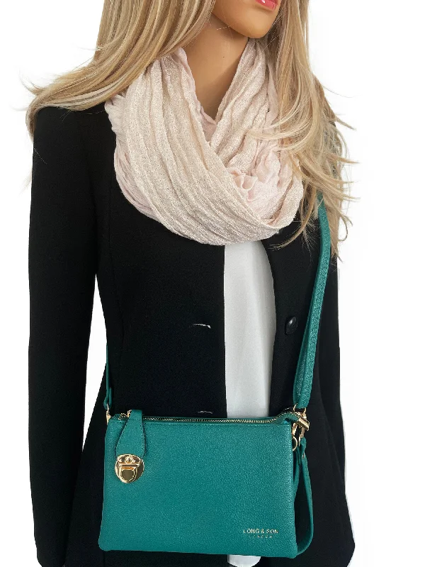 SMALL MULTI-POCKET CROSS BODY CLUTCH BAG WITH WRISTLET - TEAL